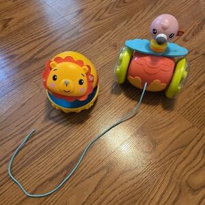 Fisher-Price Bat & Wobble Lion & Paradise Pals Pull-Along Flamingo Baby Toys Set